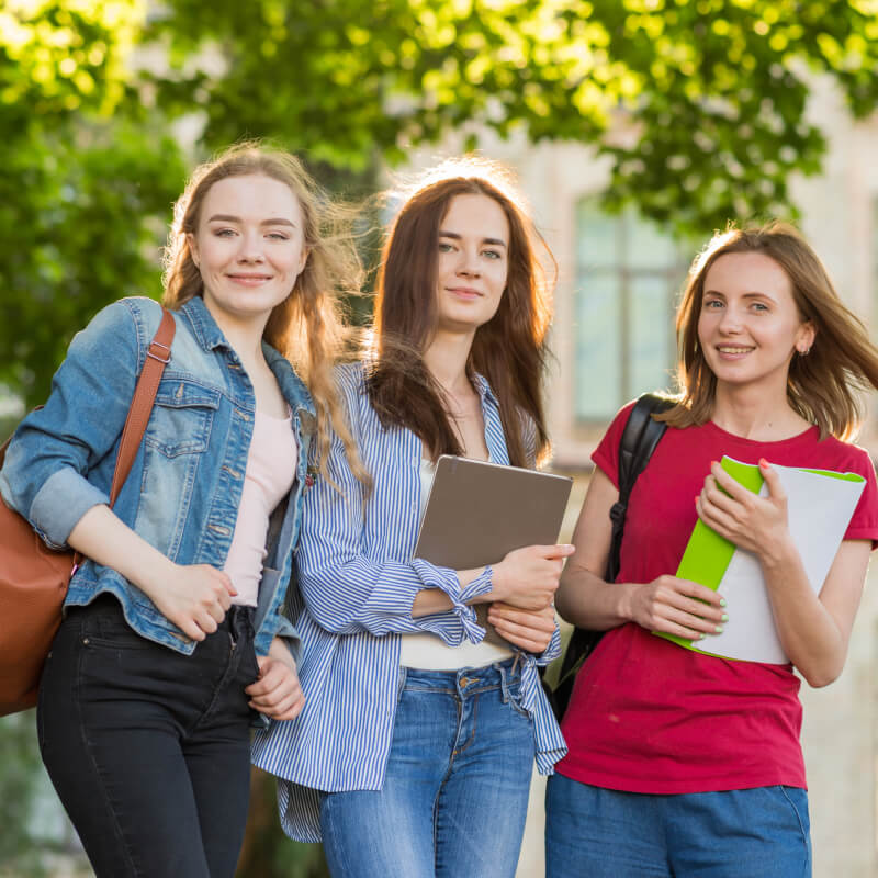 Student preparing for entrance exams with study materials